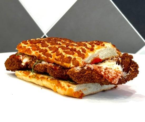 CRISPY FRIED CHICKEN PARMIGIANA