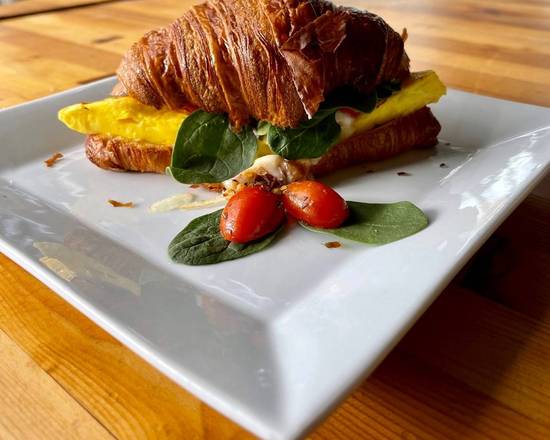 Morning Mustard Melt - Scrambled Eggs, Provolone, tomatoes, spinach, and mustard Sandwich